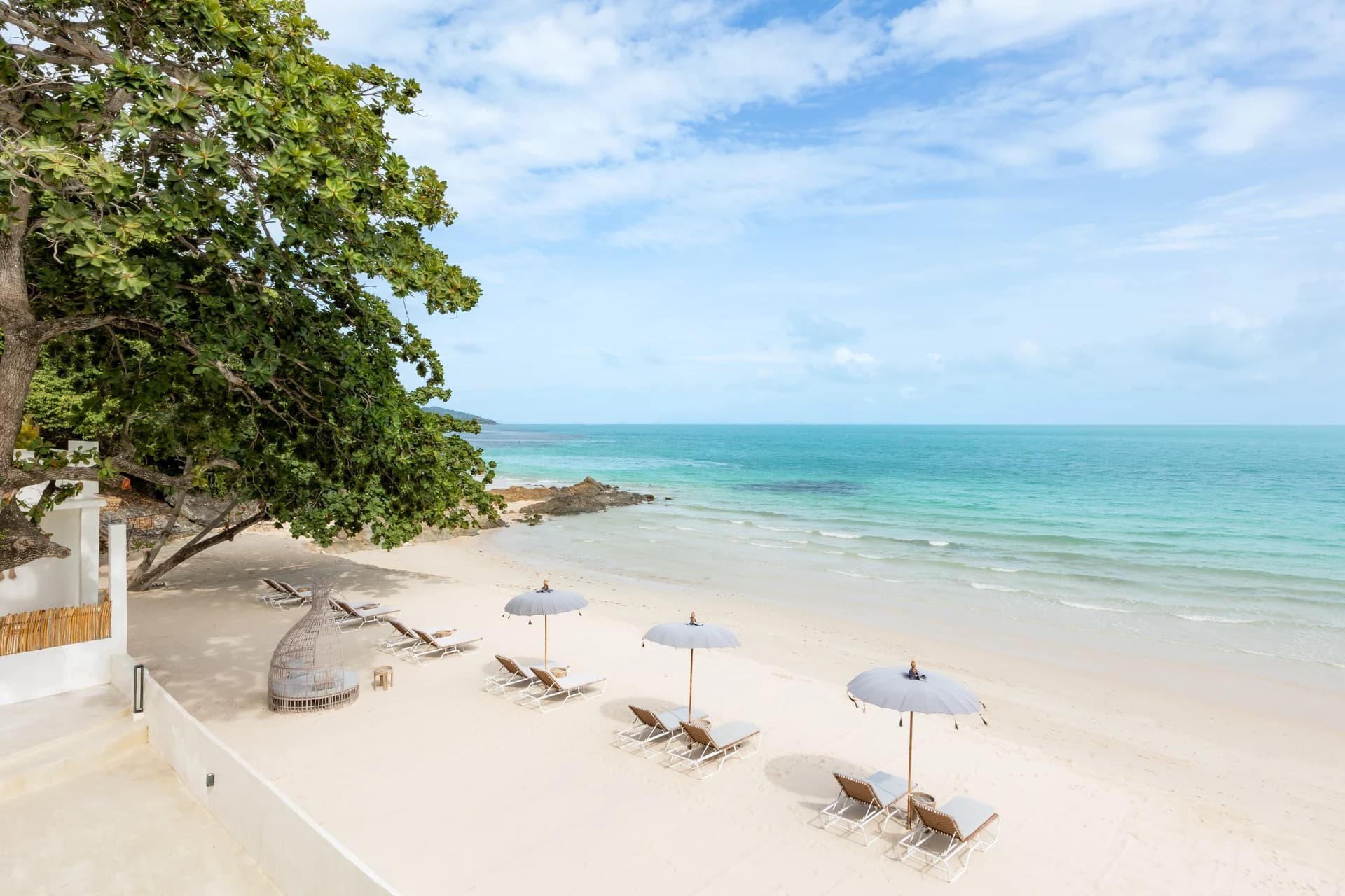 The calm, gently shelving, safe-swimming sandy beach at Bantai Beach, Maenam, Cape Beach Villa