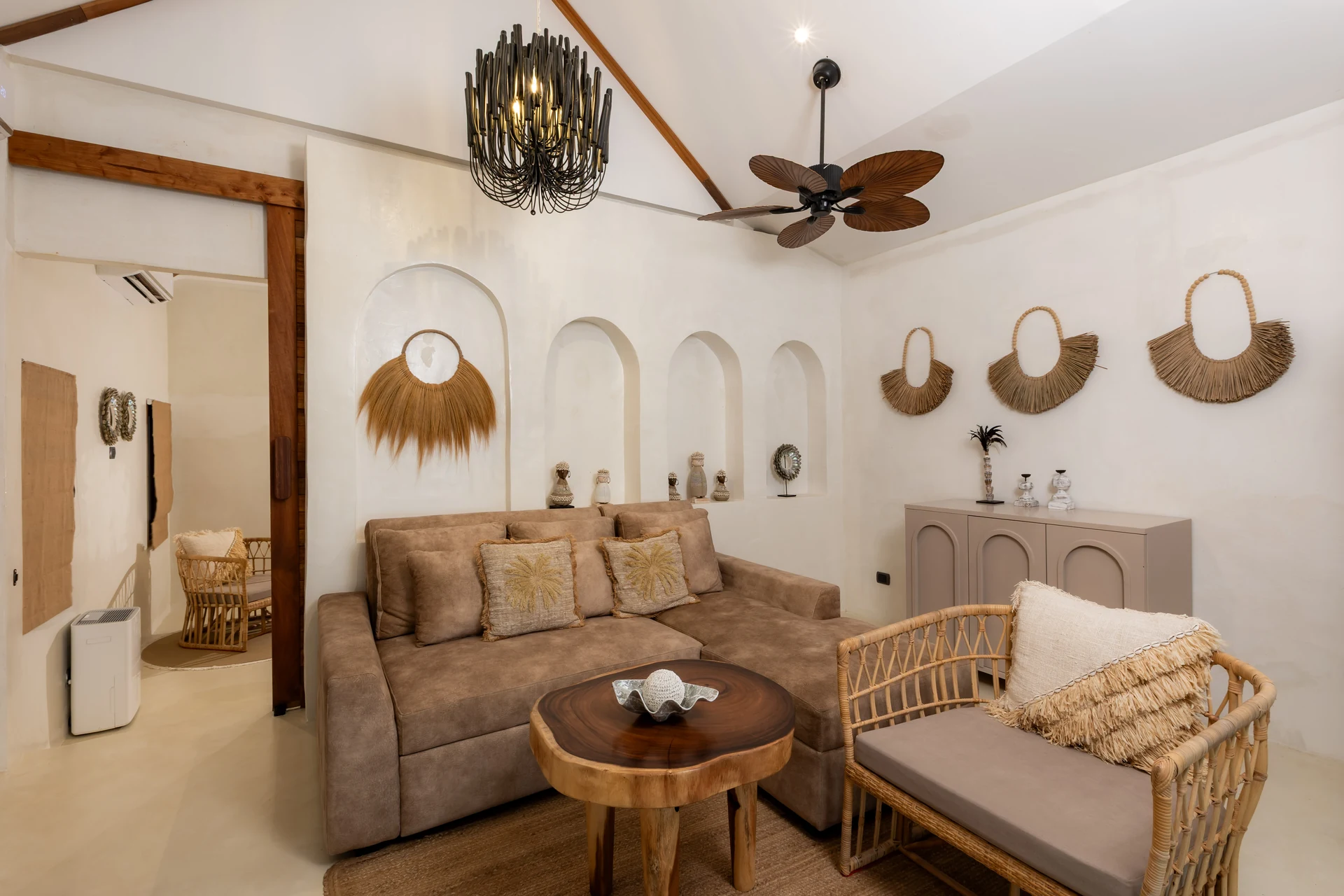Comfort Villa — boho living room with rattan seating (Villa Ginger) — photo 19